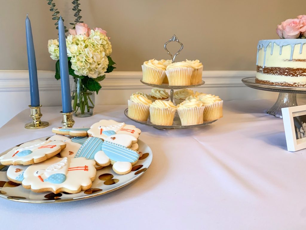 baby shower, dusty blue shower, naked cake, donut tower, cake pops, balloon garland, Pastel blue shower, all white shower, hydrangea, roses 