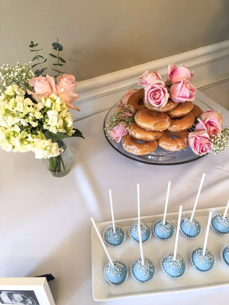 baby shower, dusty blue shower, naked cake, donut tower, cake pops, balloon garland, Pastel blue shower, all white shower, hydrangea, roses 