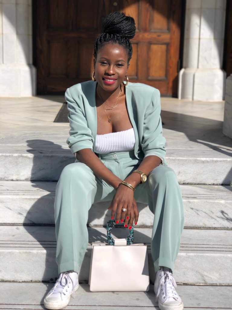 light green pant suit, leather converse, flowers, ranunculus, roses, marble steps