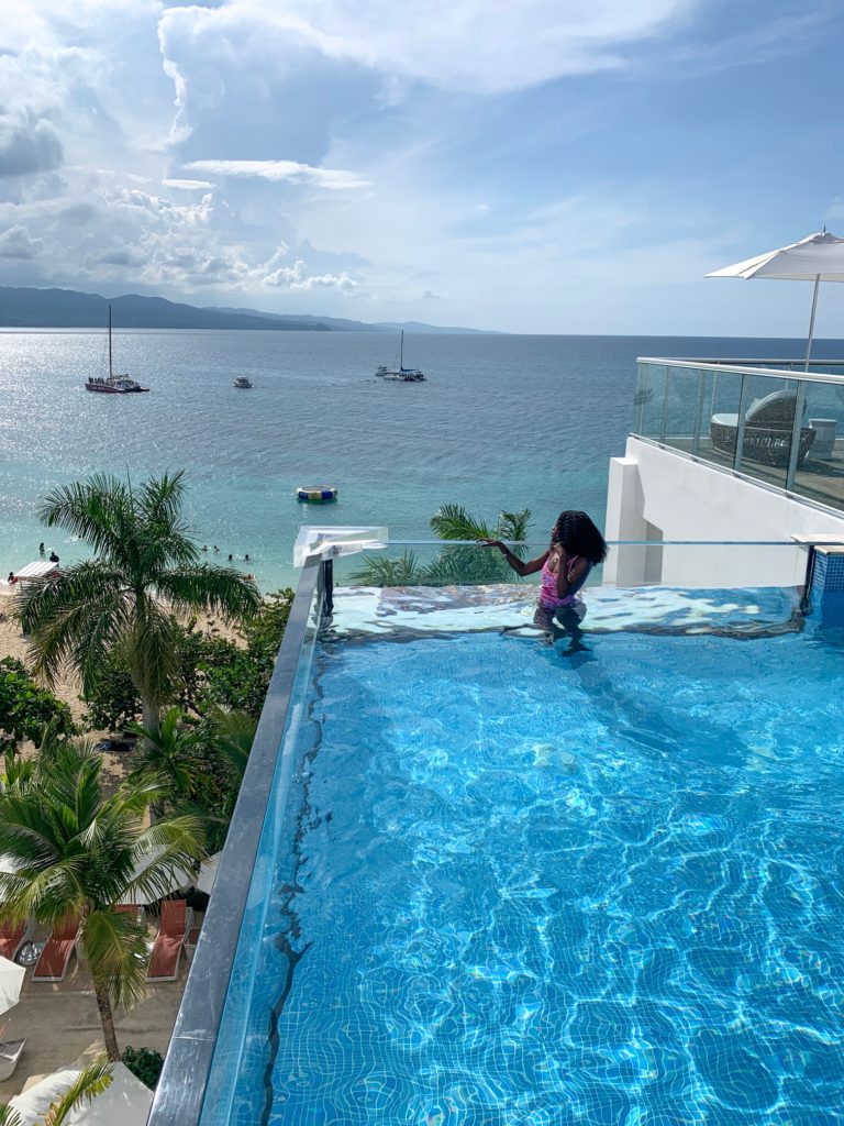 doctor's cave beach, s hotel Jamaica, black girl, rooftop pool, infinity pool