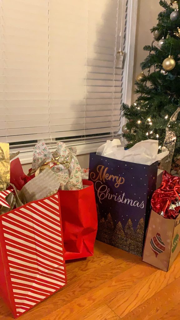 holiday games, Secret Santa, group dinner, small intimate dinner, friends, Christmas celebration, gifts